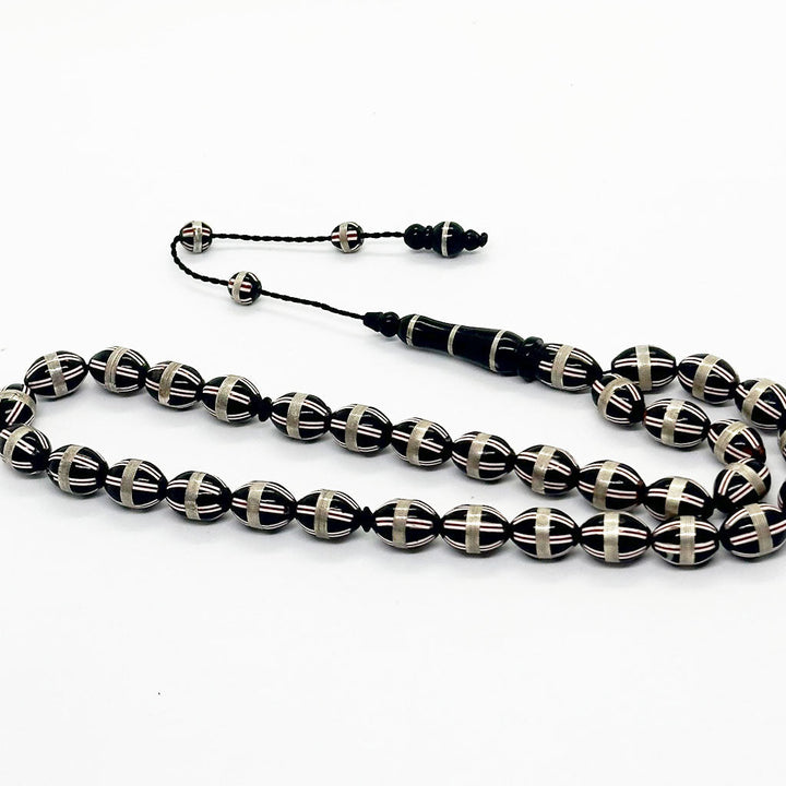 كوك اسود مطعم بالفضة 10 ملي 33 حبايه