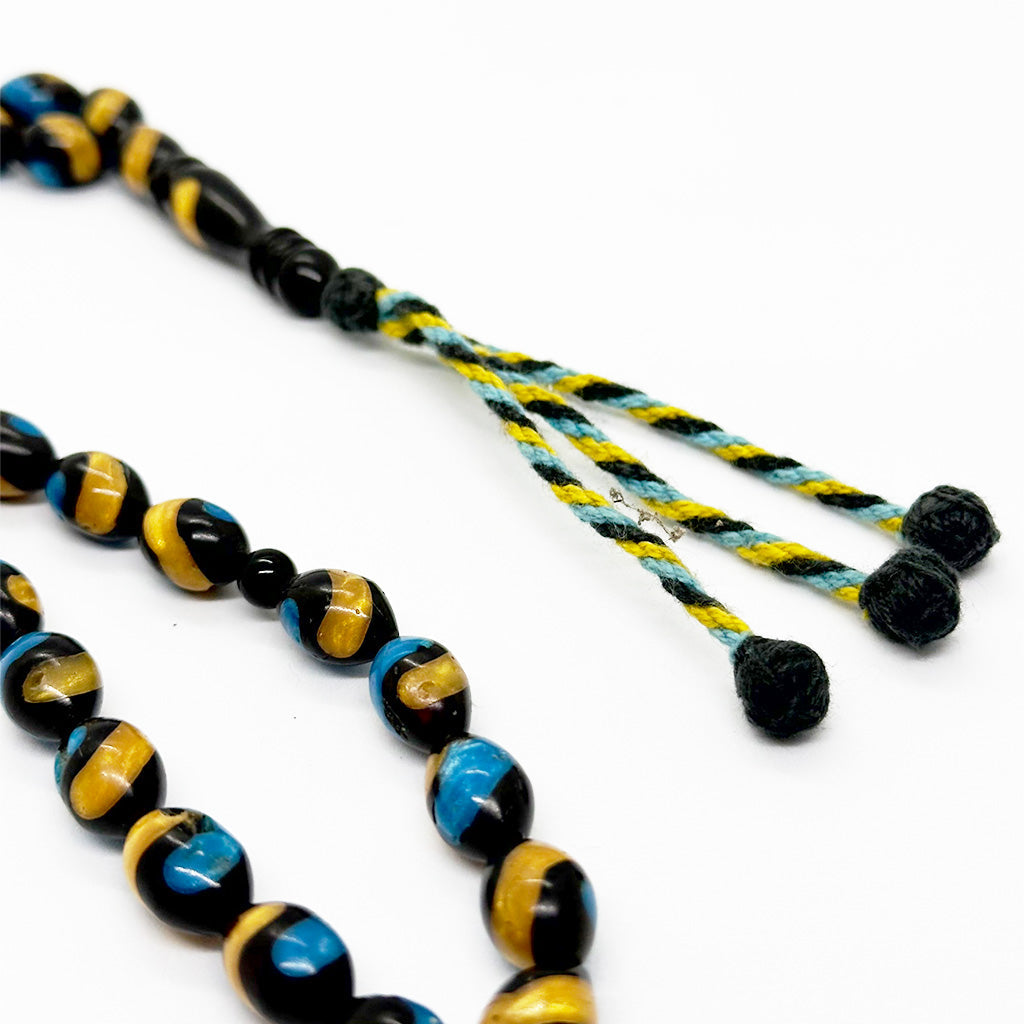 سبحه كوك مطعم بتراب الكهرمان 10 ملي 33 حبايه