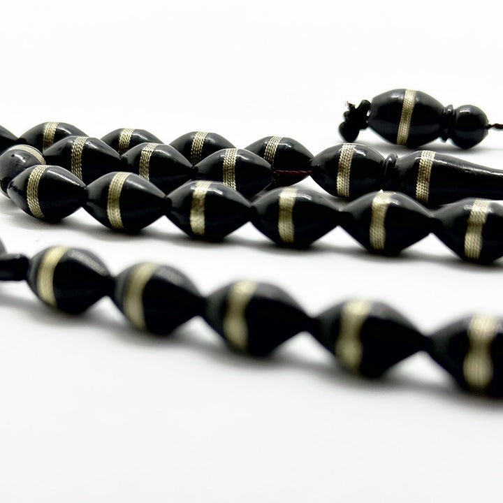 كوك اسود زيتونه بالمعدن 8 ملي 33 حبايه