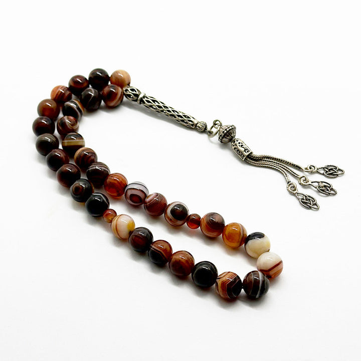 999 حجر عقيق سليماني عيون احمر 10 ملي 33 حبايه دلايه فضه