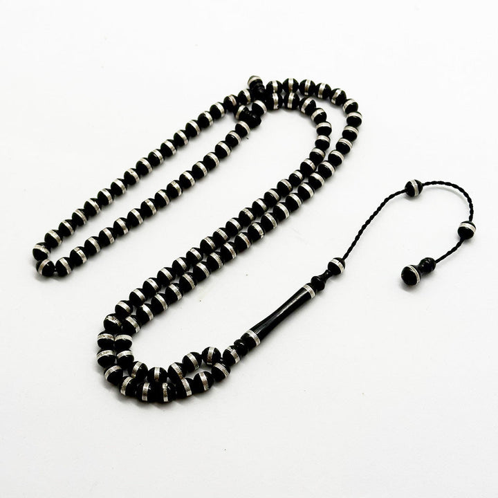 كوك اسود مطعّم بالفضة 6 ملي 99 حبّةعيار 999