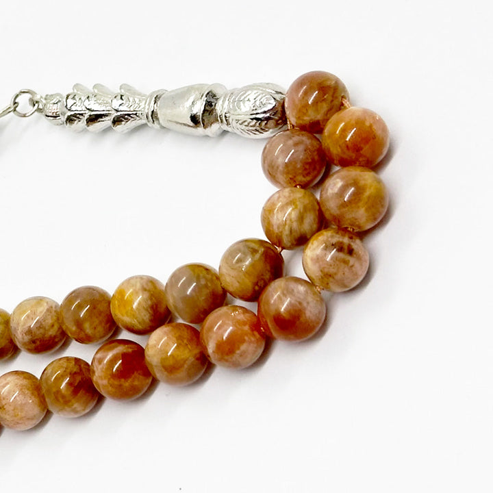 حجر مرجان الاحفوري 33 خرزة 10 ملي