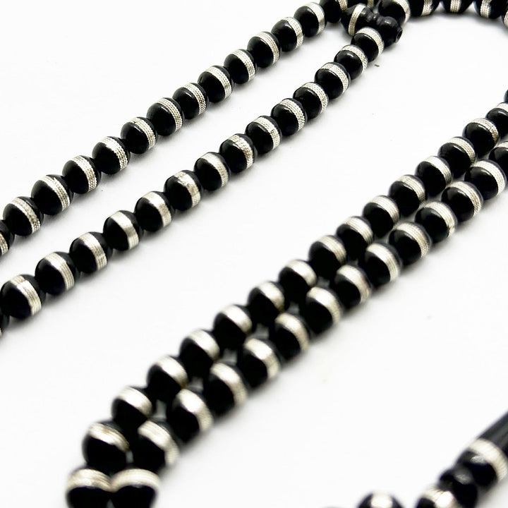 كوك اسود مطعّم بالفضة 6 ملي 99 حبّةعيار 999